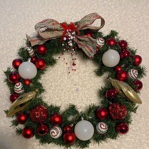 Festive Holiday Wreath with Red and Gold Accents